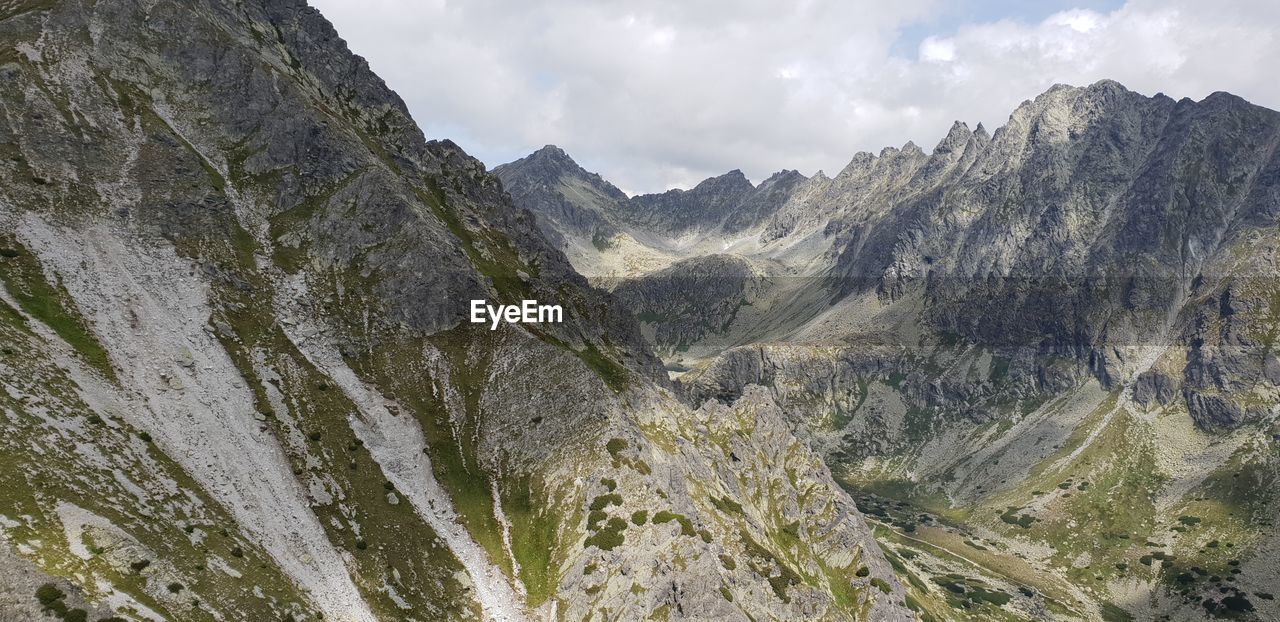 Scenic view of mountain range against sky