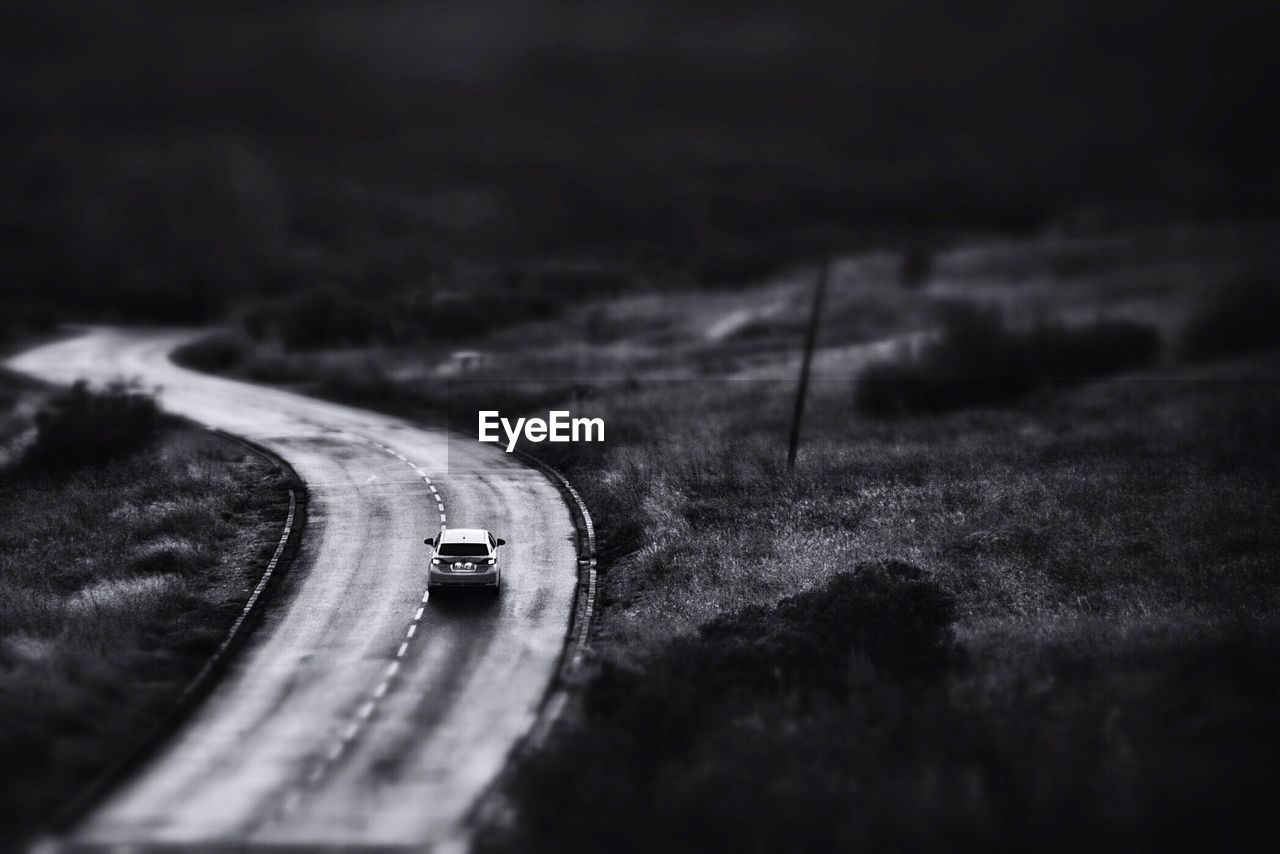 CAR MOVING ON ROAD