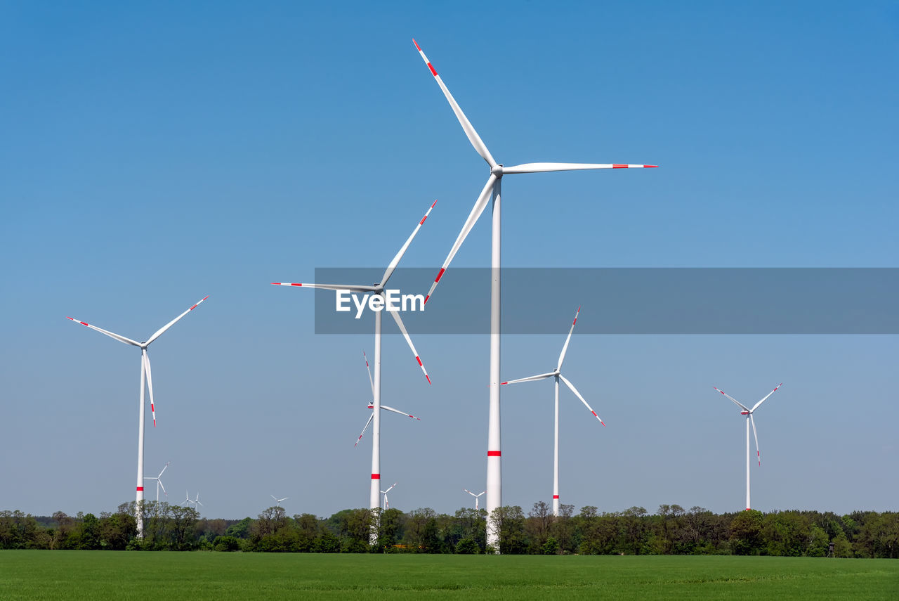 Wind turbines in an agricultural area seen in germany