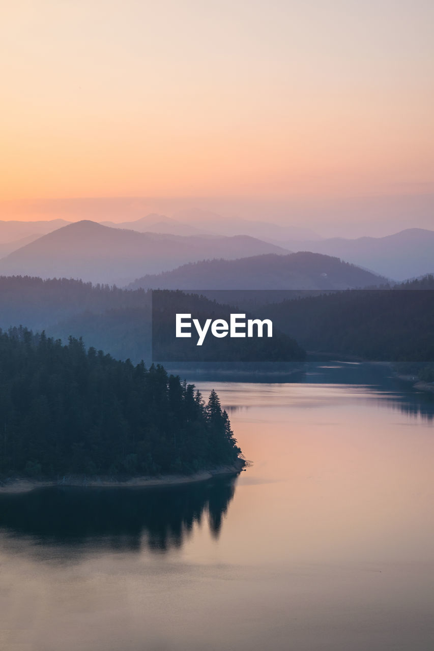 Scenic view of lake during sunset