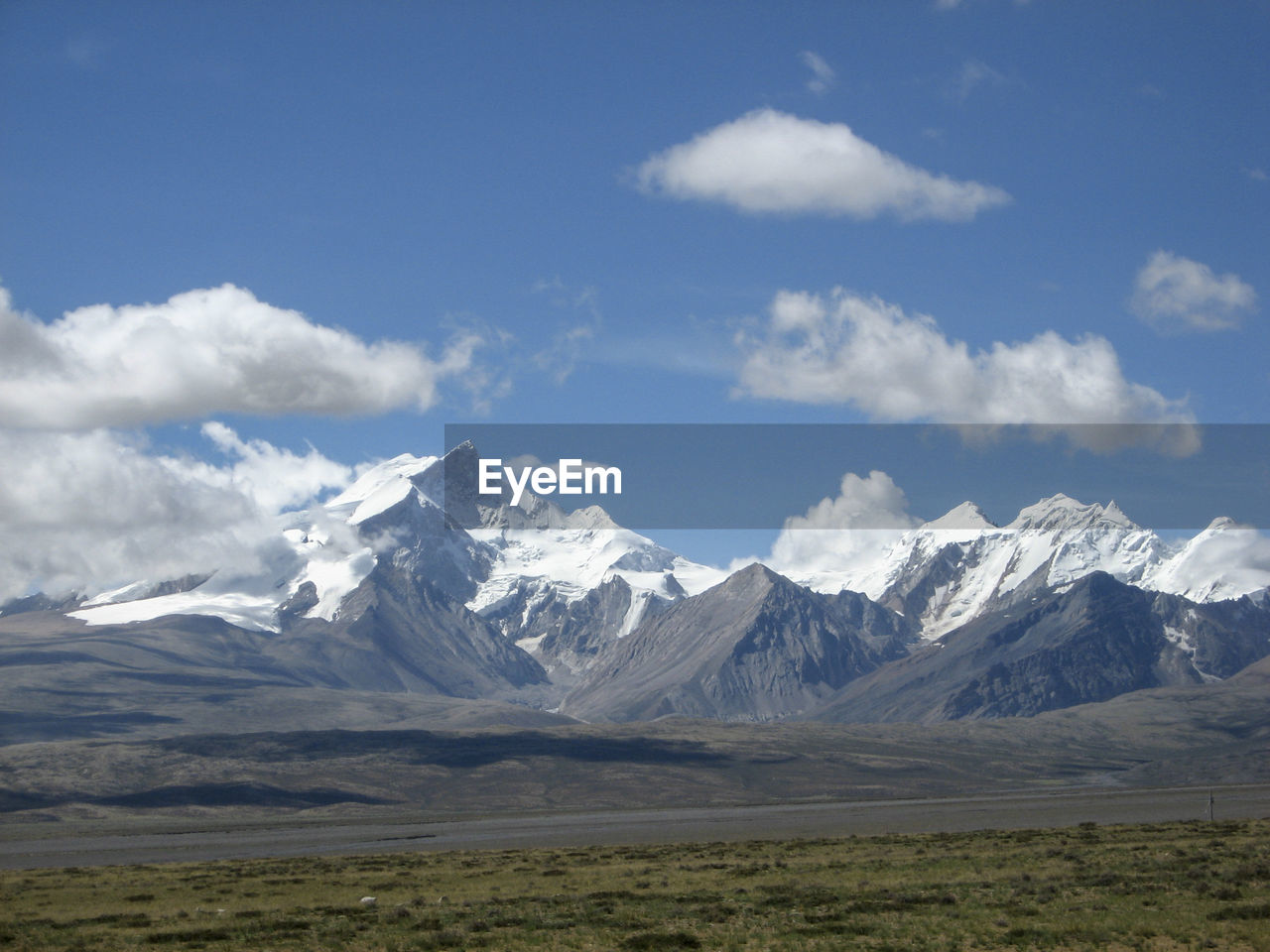 The beautiful and spectacular gangrenbozi mountains in the distance