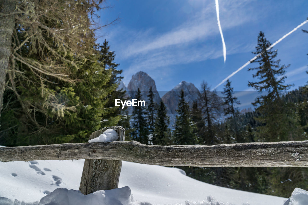 Scenic view of snow covered mountains against sky