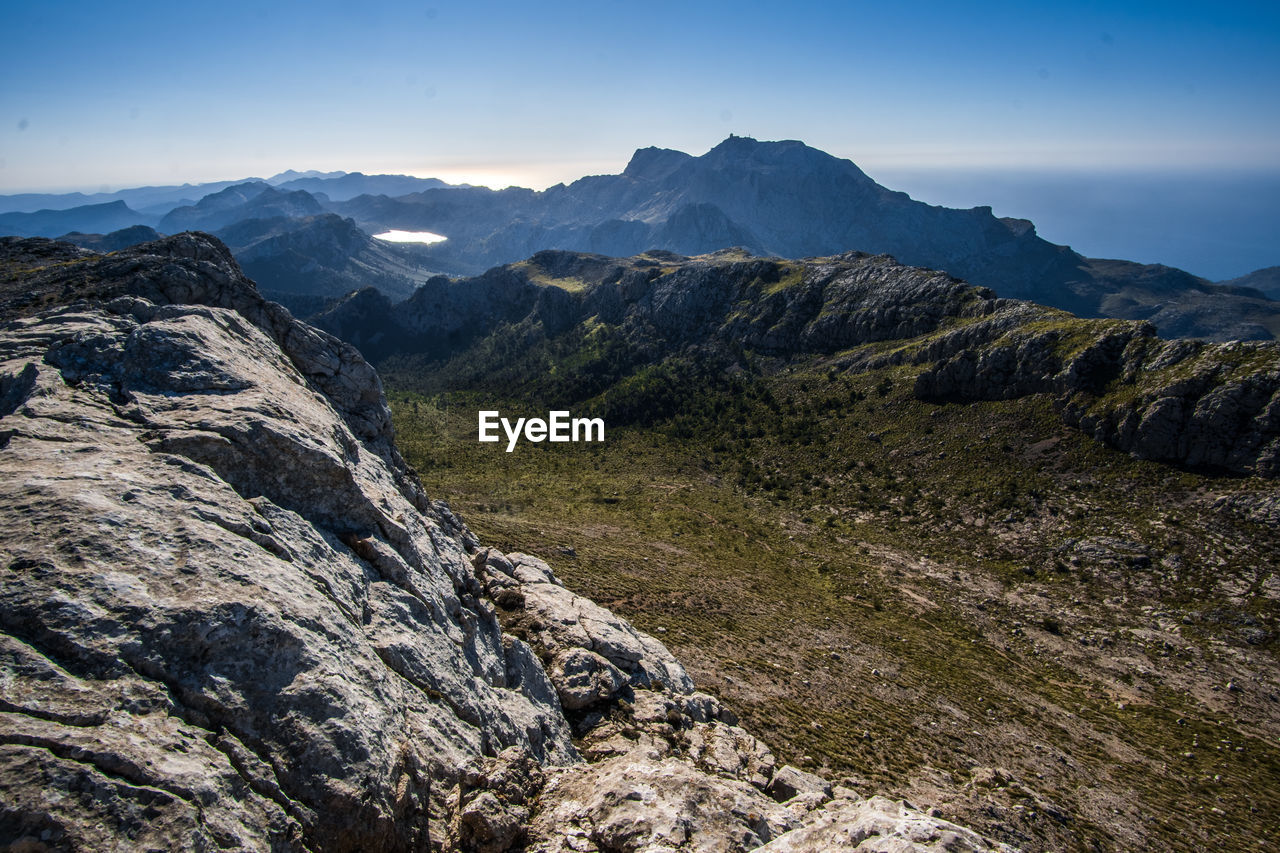 Scenic view of rocky mountains against clear sky