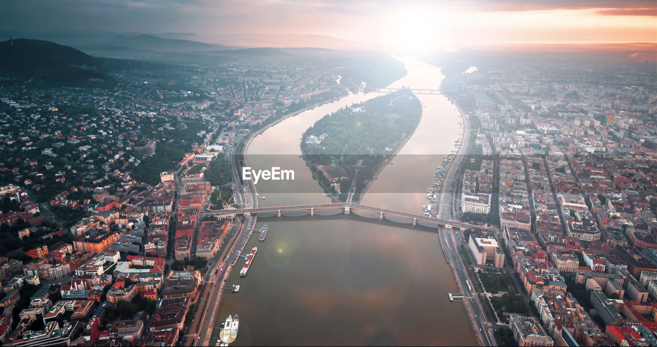 Aerial view of city buildings against sky