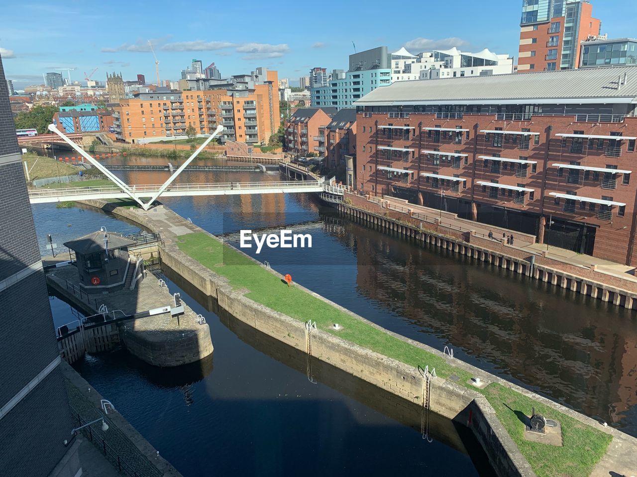 High angle view of river amidst buildings in city