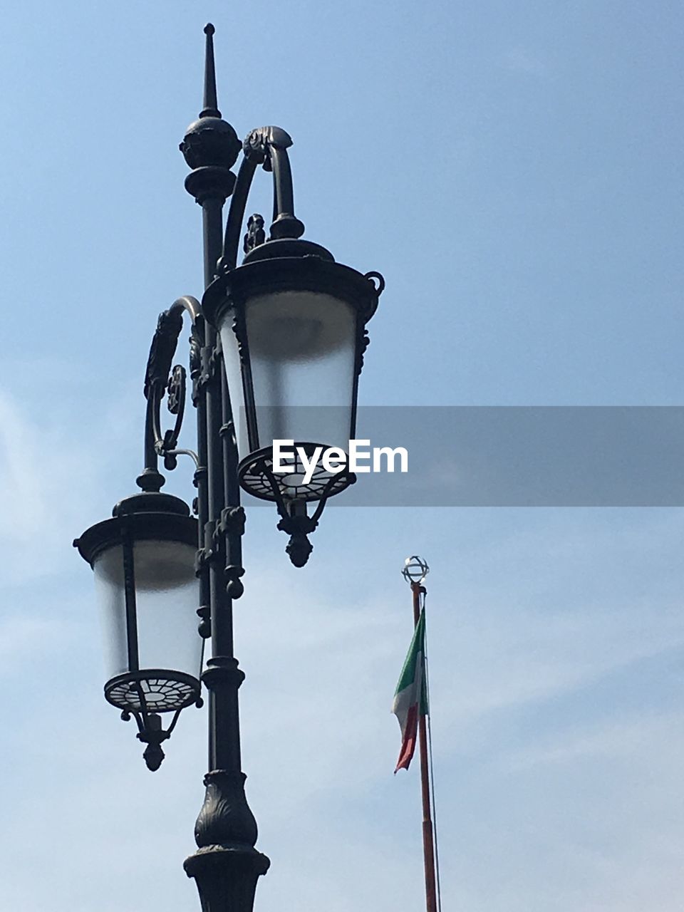 Low angle view of street light against sky