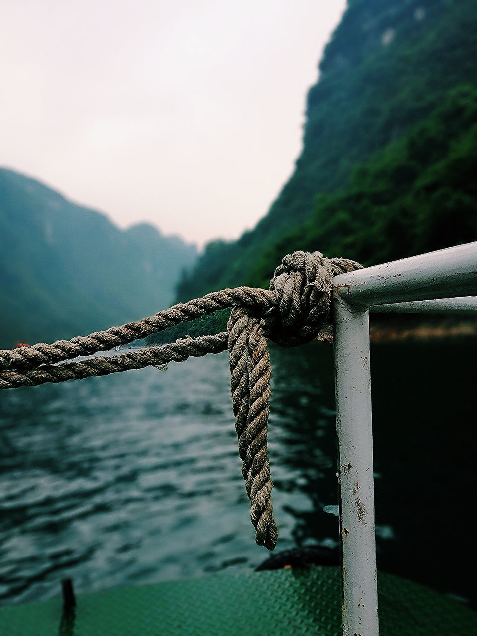 Close-up of rope tied on boat