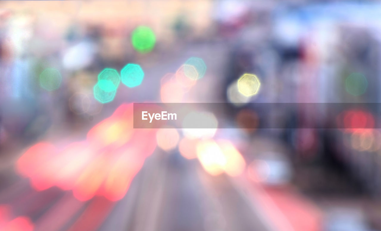 Defocused image of illuminated lights at night