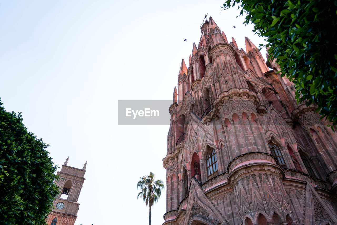 Low angle view of traditional building against clear sky