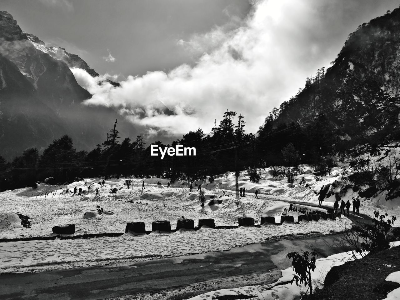 Panoramic view snow filled lachung valley against sky