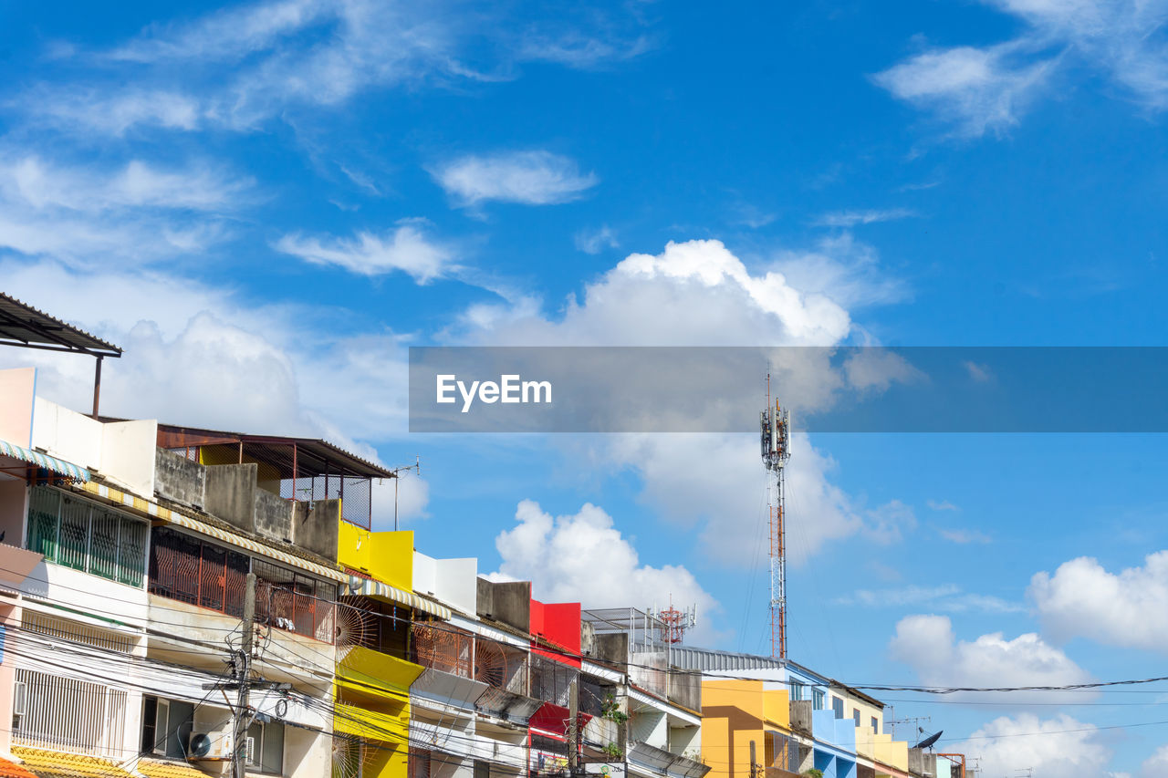 LOW ANGLE VIEW OF INDUSTRY AGAINST SKY