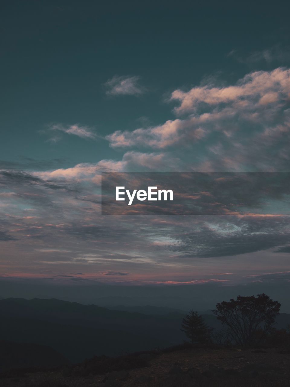 SCENIC VIEW OF LANDSCAPE AGAINST SKY DURING SUNSET