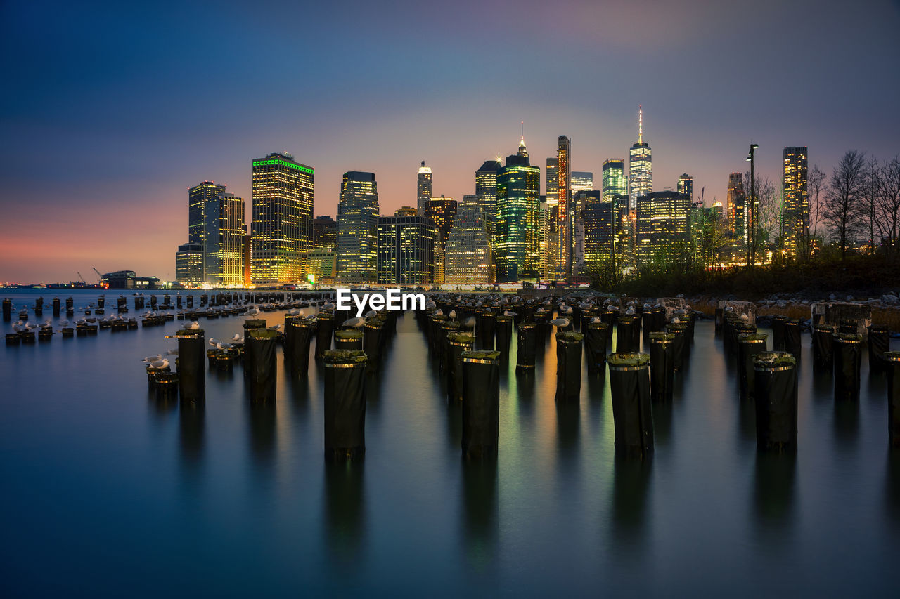 REFLECTION OF ILLUMINATED BUILDINGS IN WATER