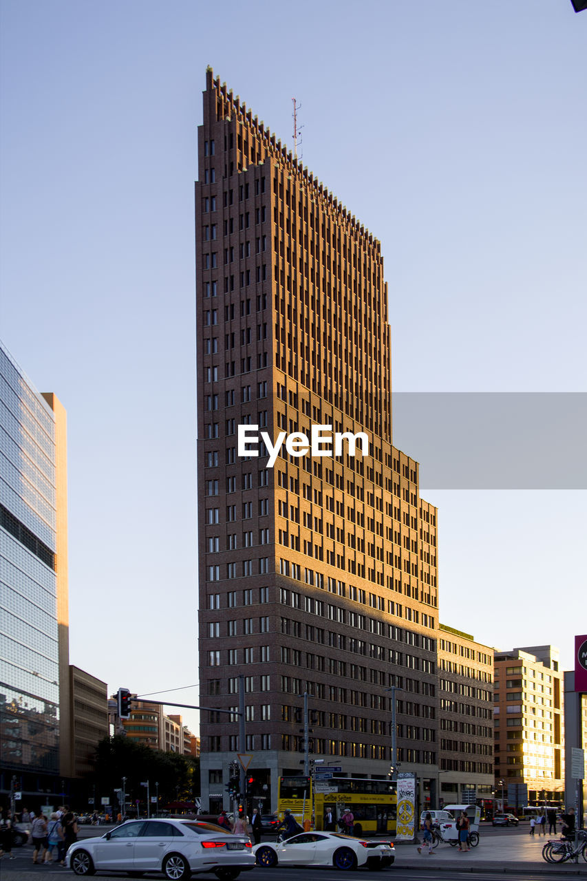 Low angle view of skyscrapers against clear sky