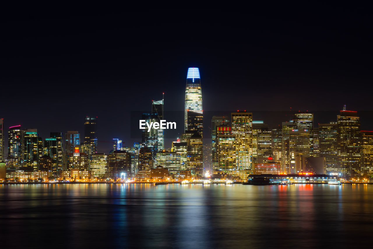 Ocean view of san francisco skyline at night 