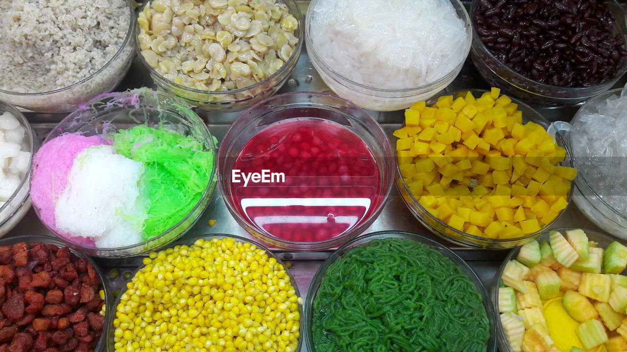 HIGH ANGLE VIEW OF VARIOUS VEGETABLES FOR SALE AT MARKET STALL