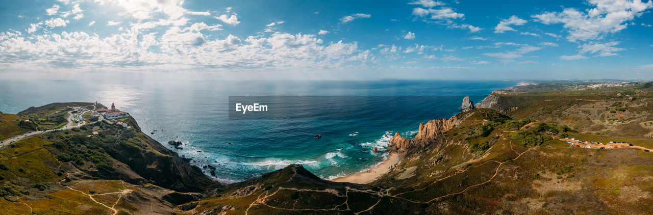 Panoramic 180 degree view of cabo da roca and ursa beach in portugal with hiking trails visible