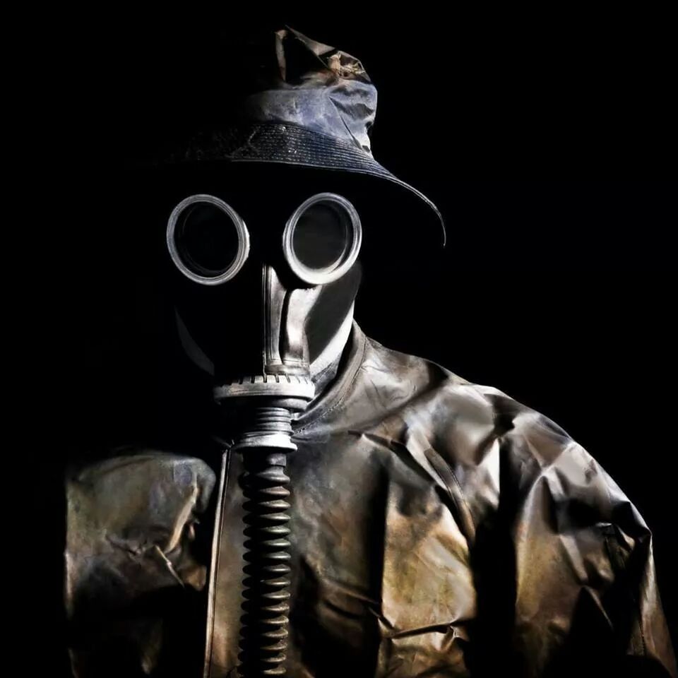 Gas mask against black background