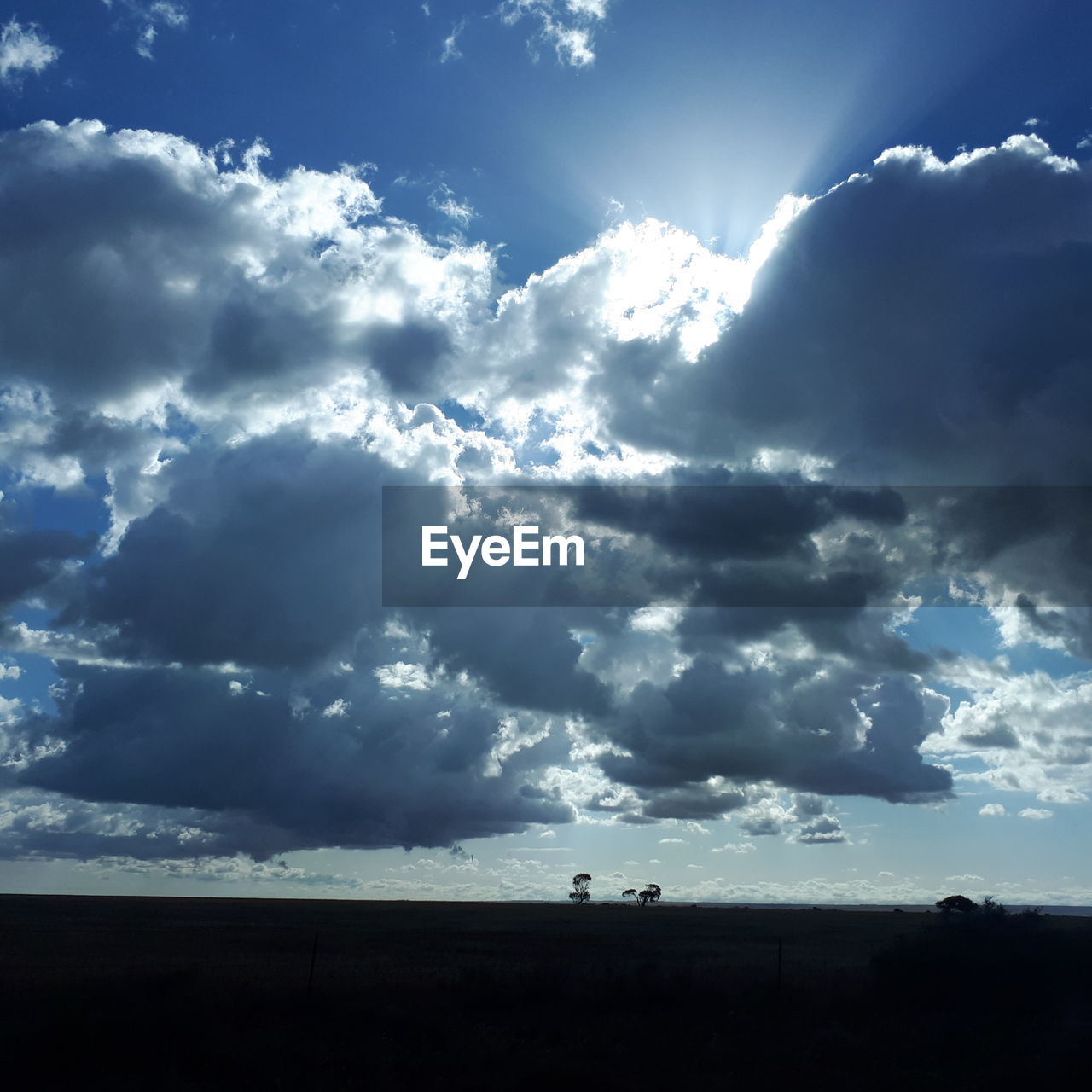 SCENIC VIEW OF SKY OVER SILHOUETTE LANDSCAPE