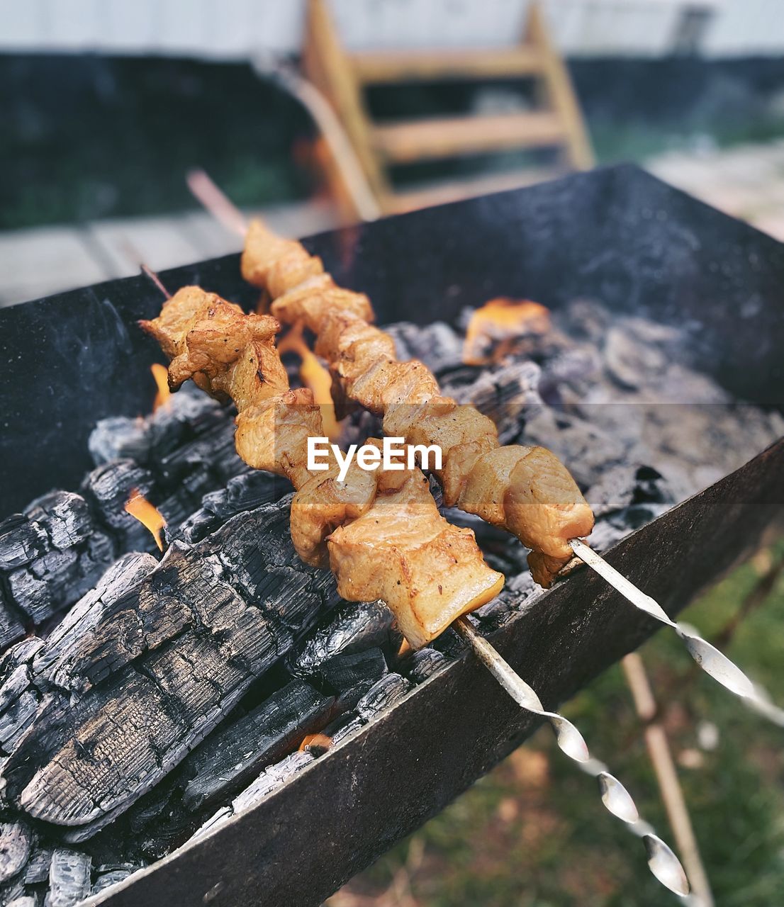 Close-up of meat on barbecue grill