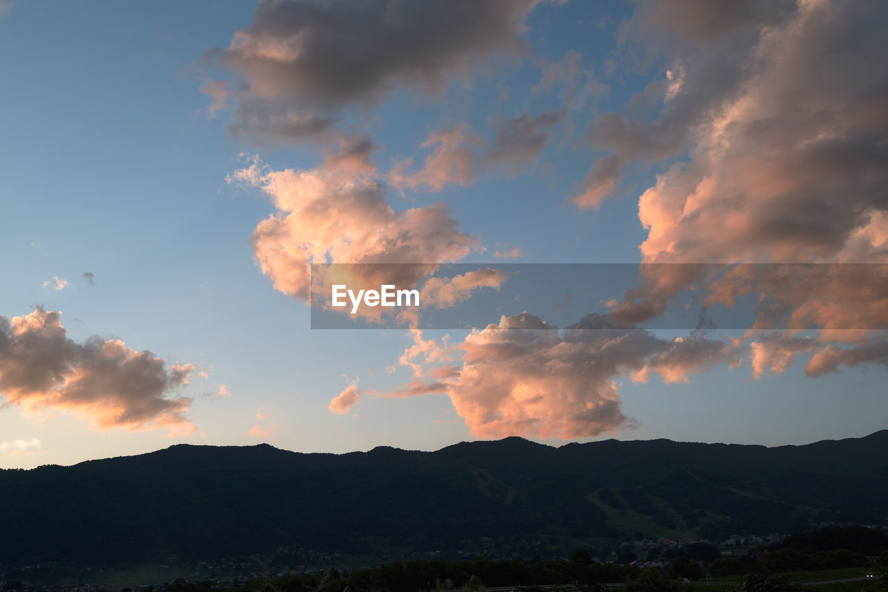 SILHOUETTE LANDSCAPE AGAINST SKY DURING SUNSET