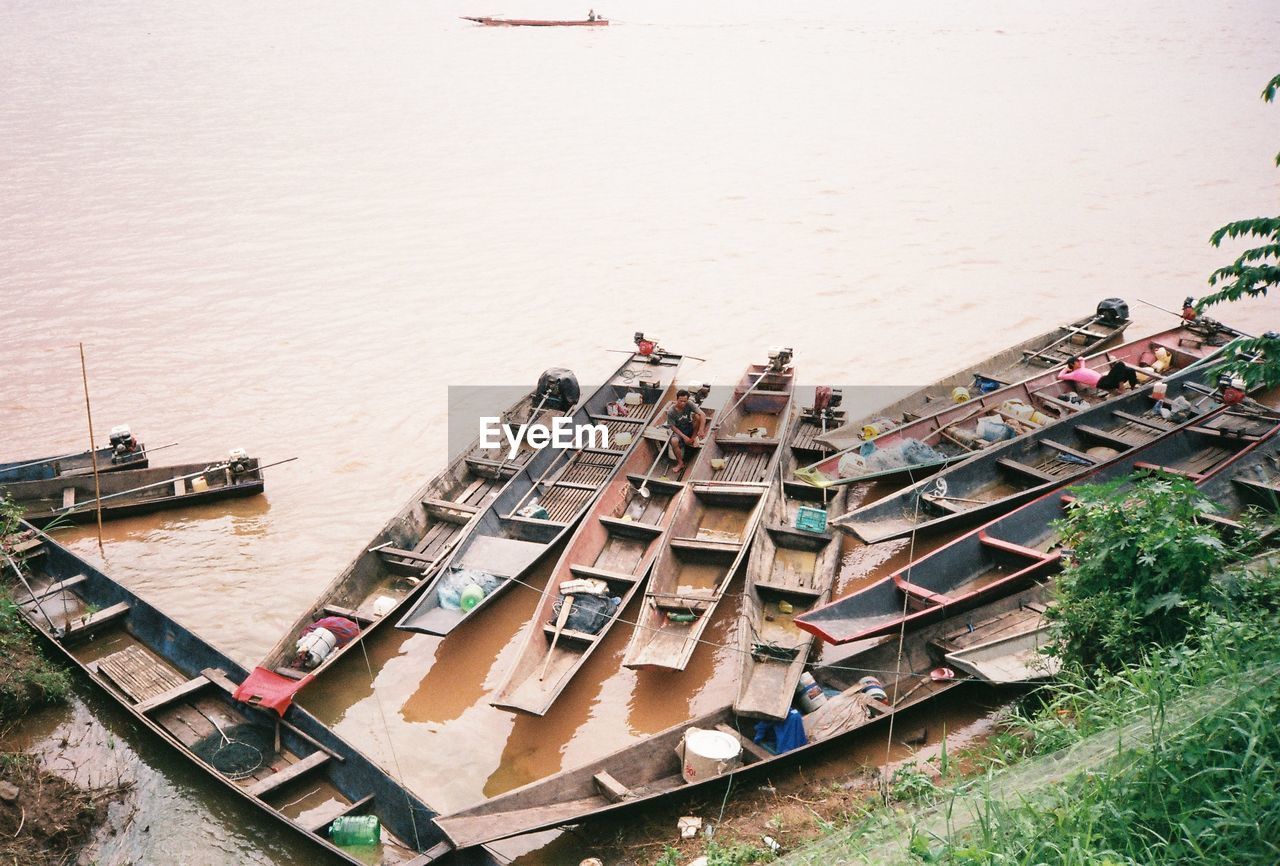 High angle view of men in boats on lake