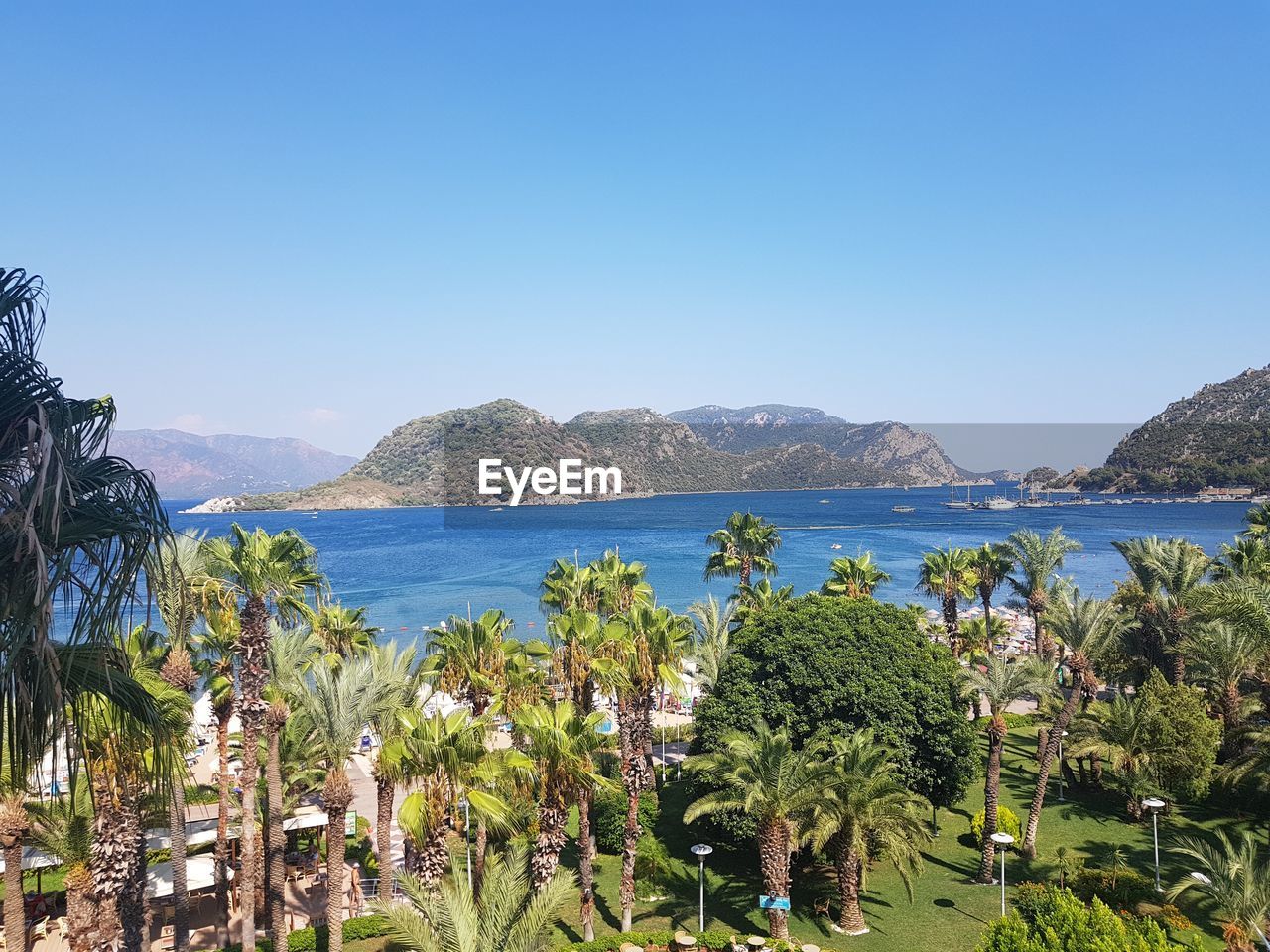 SCENIC VIEW OF BAY AGAINST CLEAR SKY