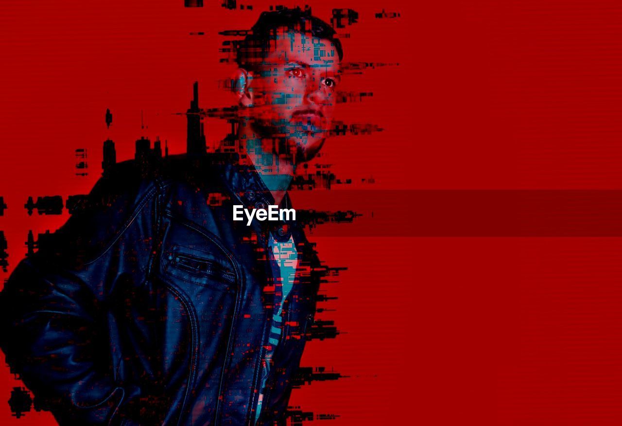 Digital composite image of man against red background