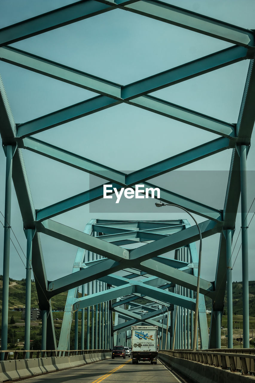 LOW ANGLE VIEW OF BRIDGE AGAINST CLEAR SKY