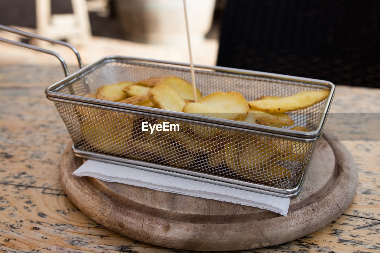 Close-up of potatoes in plate on table