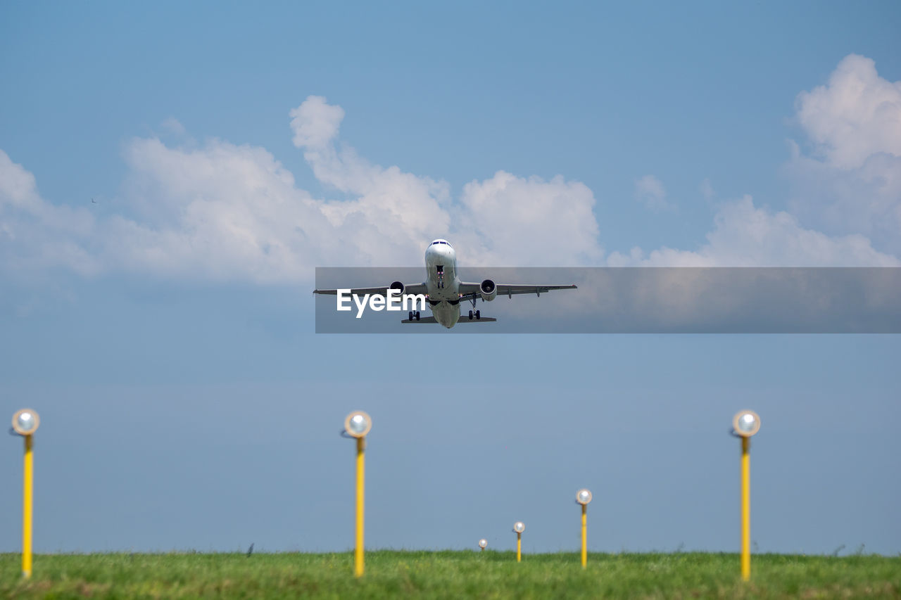 Airplane flying in sky