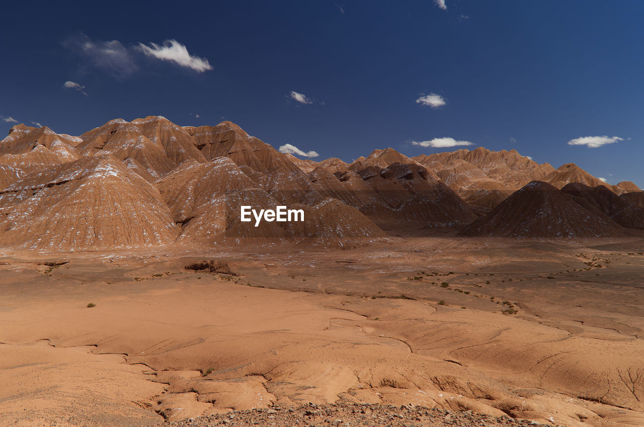 panoramic view of desert against sky