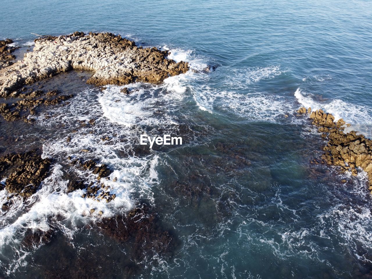 High angle view of rocks on beach