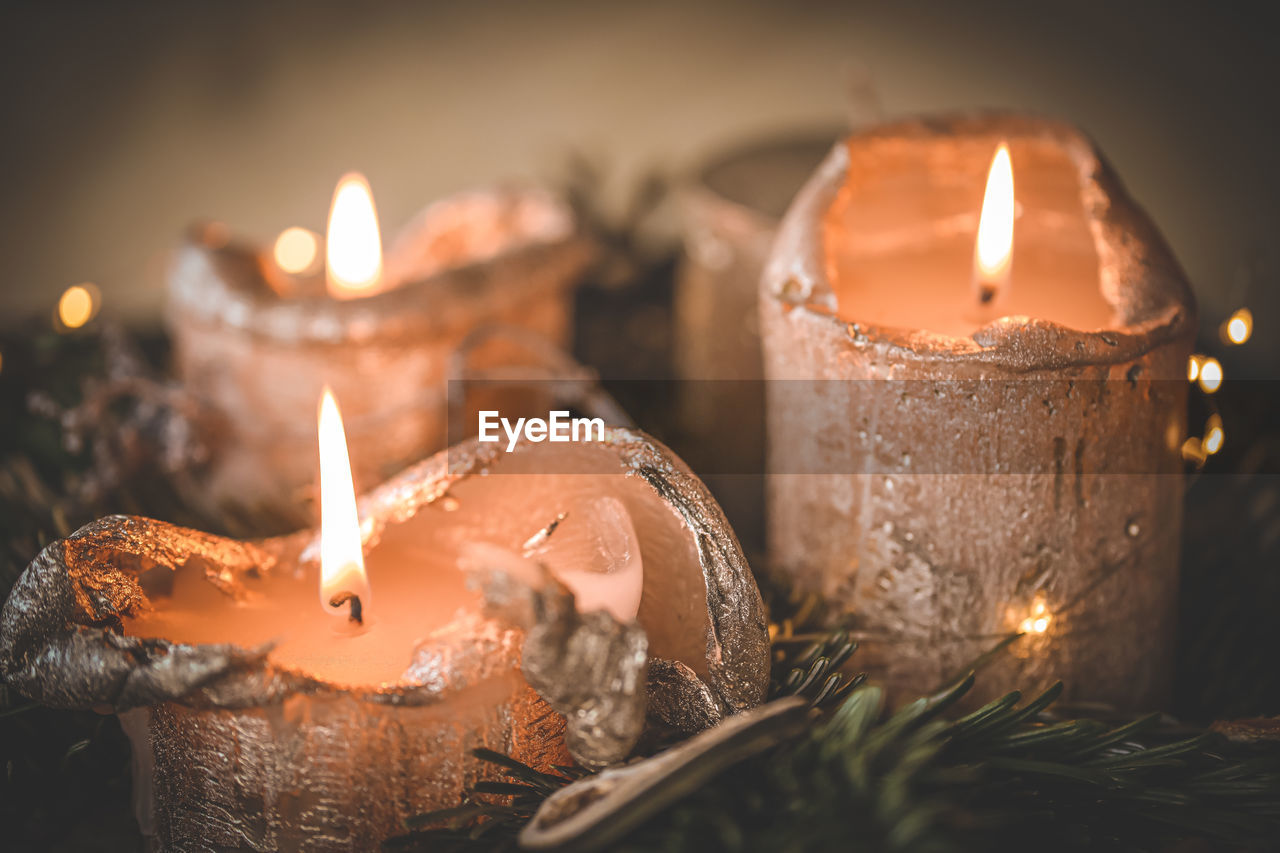 Close-up of illuminated candles