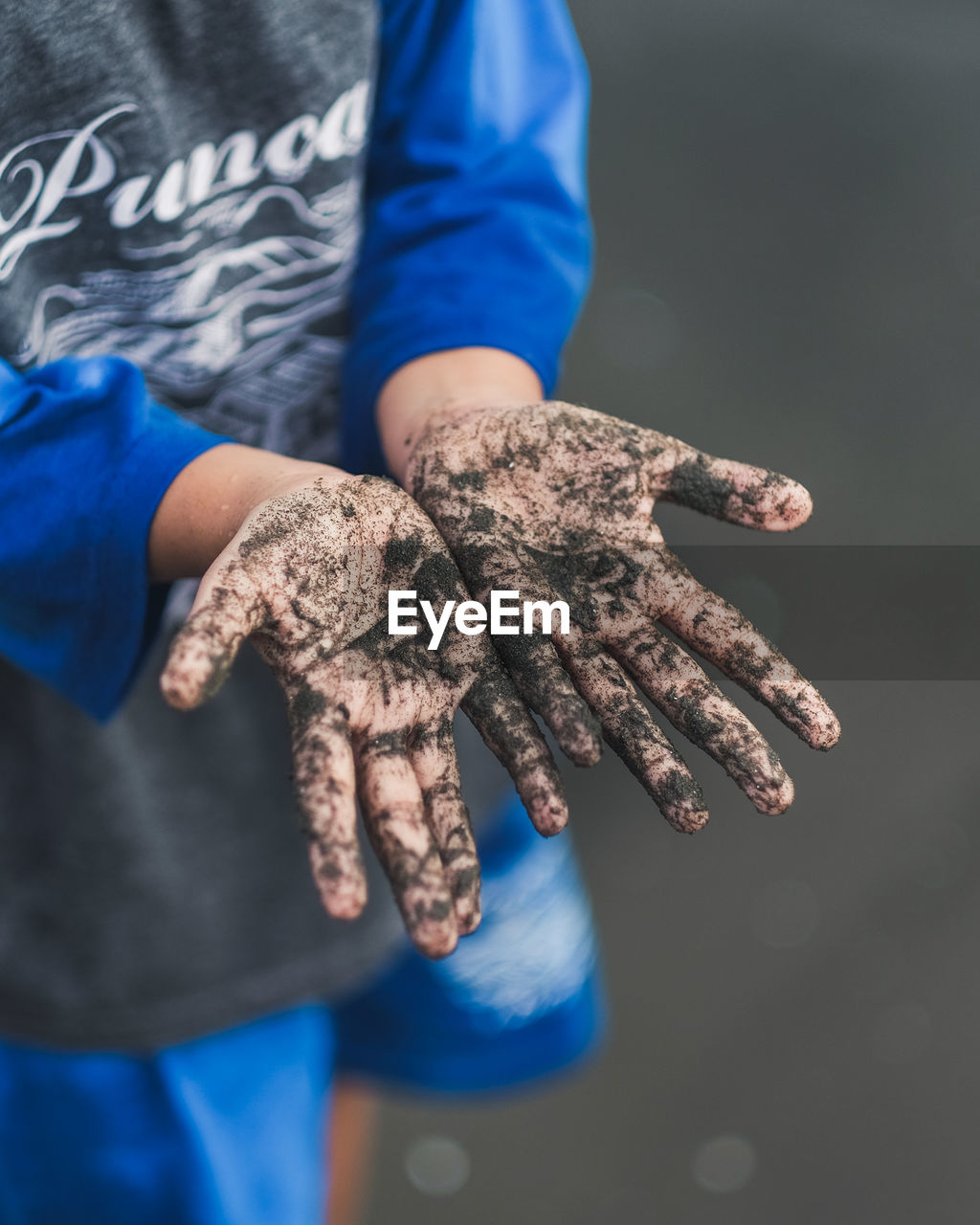 Close-up of boy with messy hands