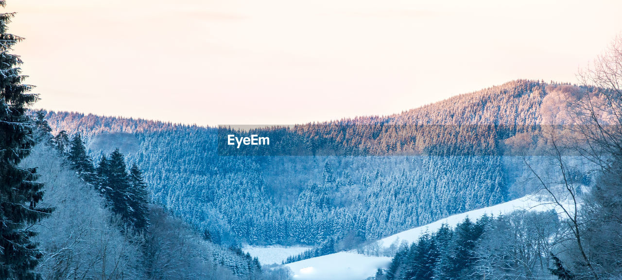 Scenic view of mountains against clear sky