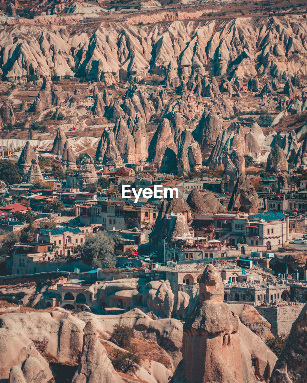 Aerial view of houses amidst rock formations