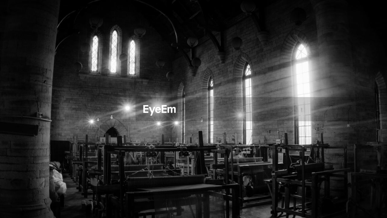 ILLUMINATED INTERIOR OF MOSQUE