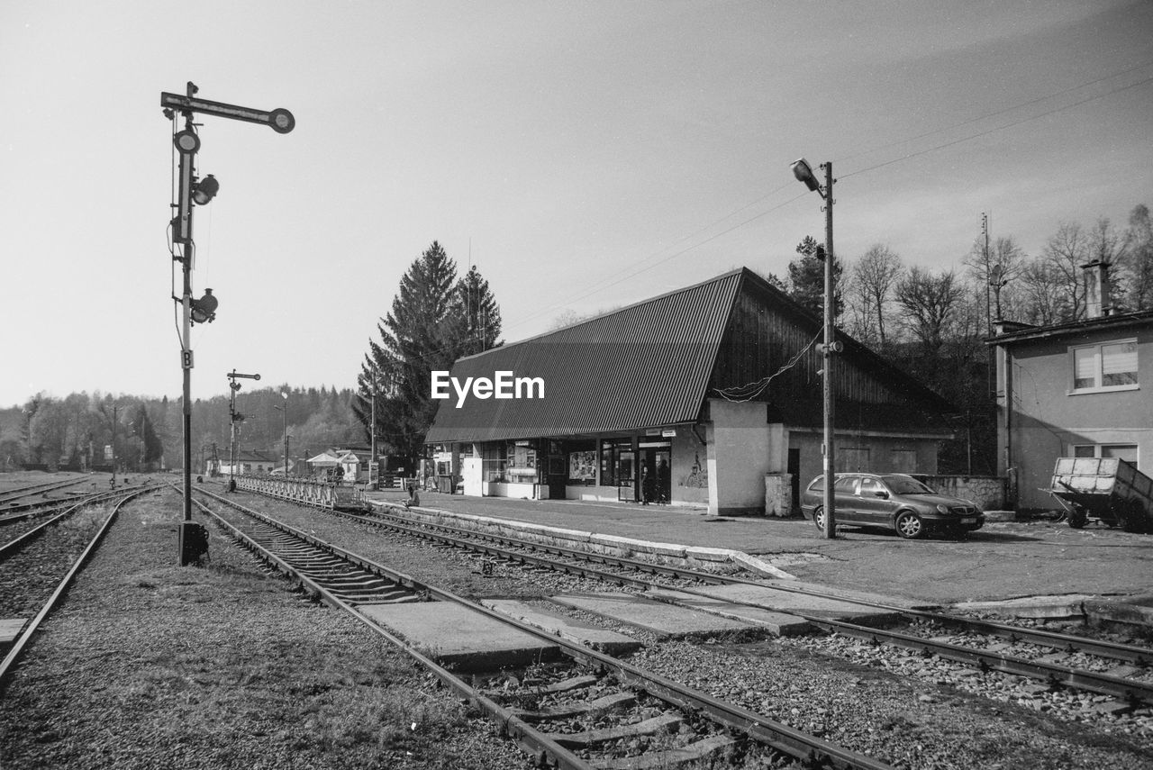 RAILROAD STATION AGAINST SKY