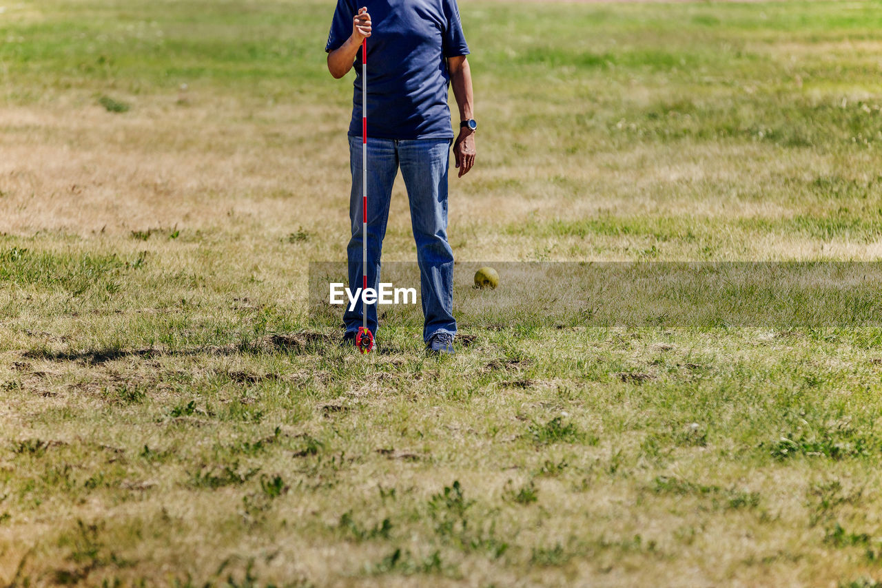 Shot put referee in field of measurement result