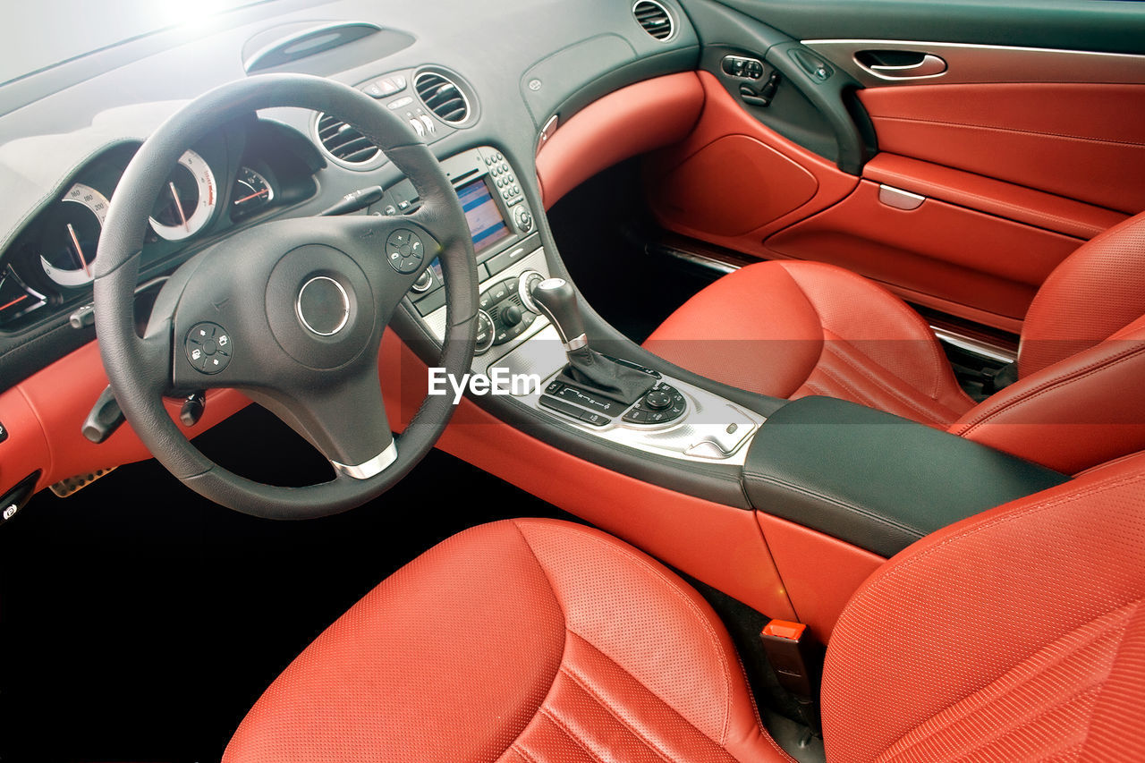 Close-up of steering wheel of car