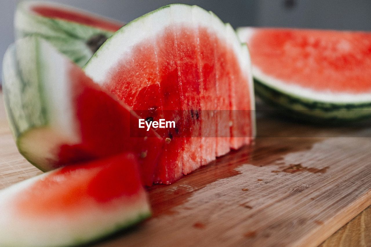 Sliced watermelon on wooden table