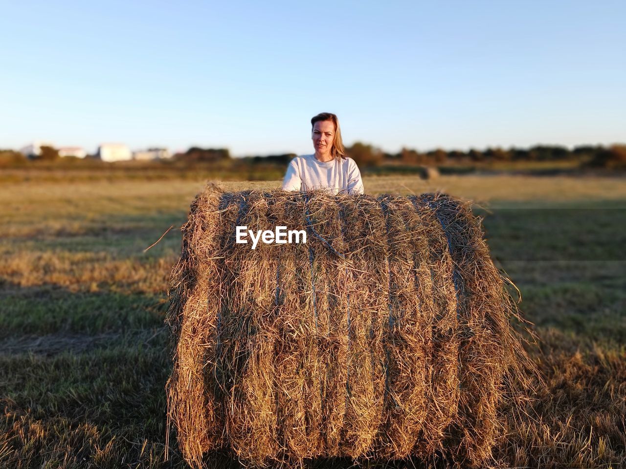 Man standing on hay