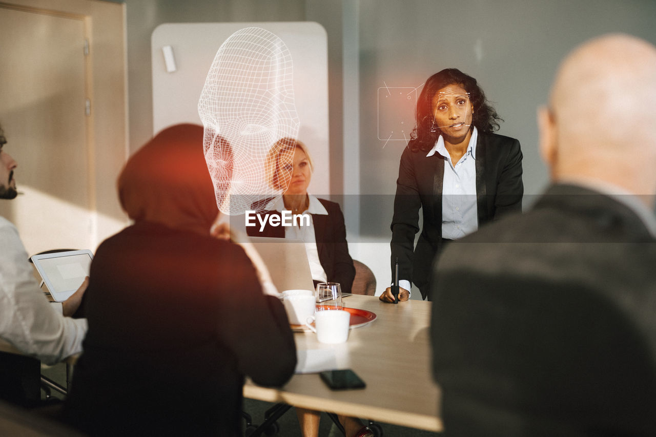 Business people having meeting in office