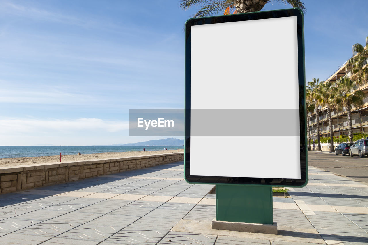 INFORMATION SIGN ON FOOTPATH BY SEA