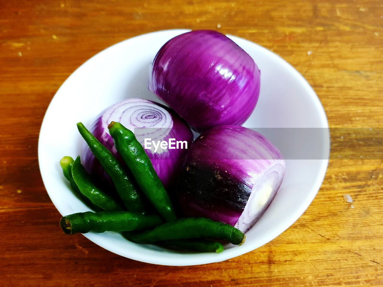 High angle view of chopped vegetables in bowl on table