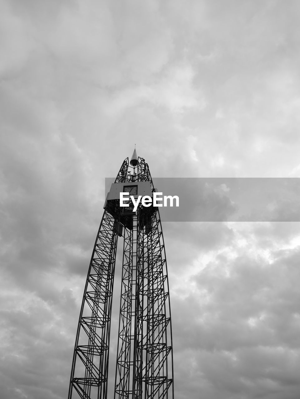 LOW ANGLE VIEW OF AMUSEMENT PARK RIDE AGAINST SKY