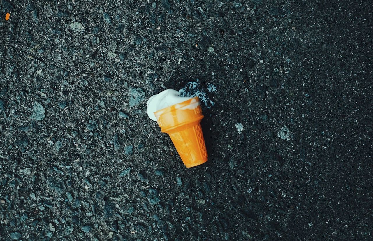 Close-up of ice cream on ground