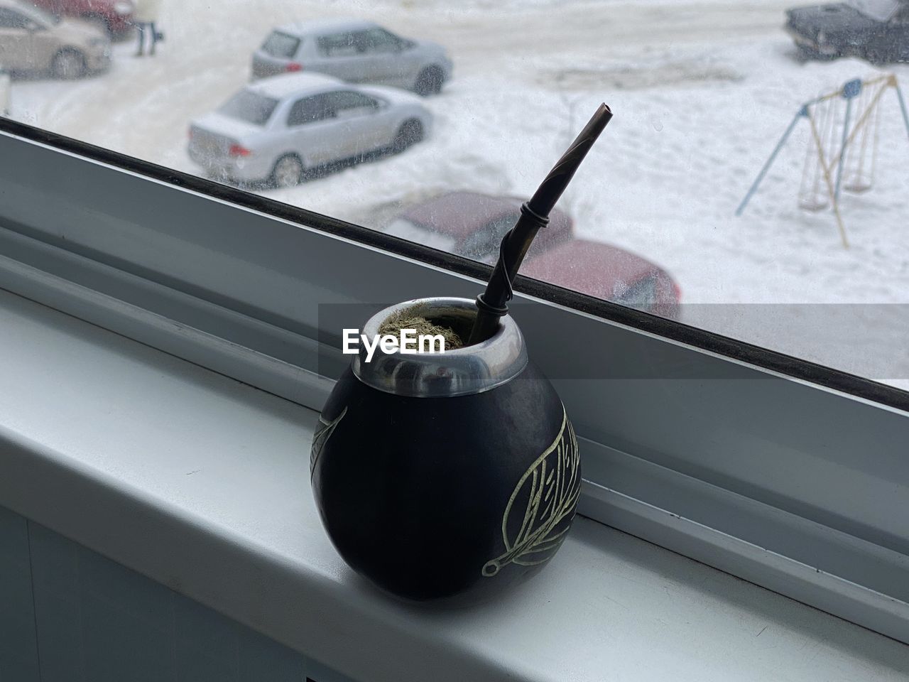 Close-up of mate on a windowsill