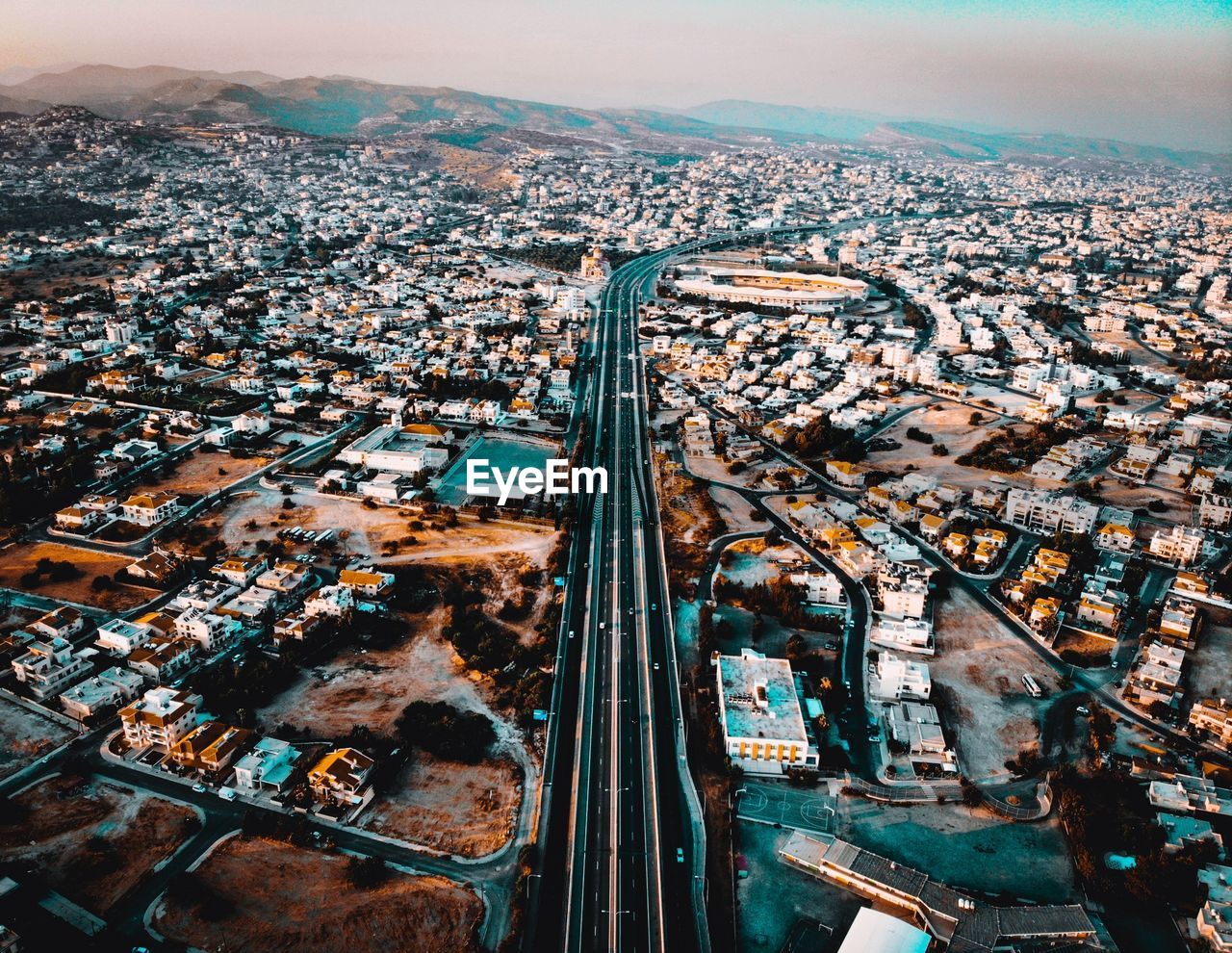 Aerial view of city buildings against sky